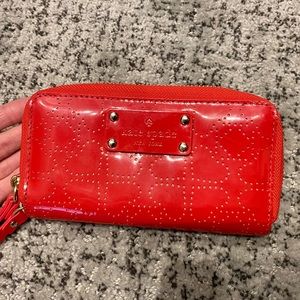 Kate Spade ♠️ red perforated wallet/wristlet